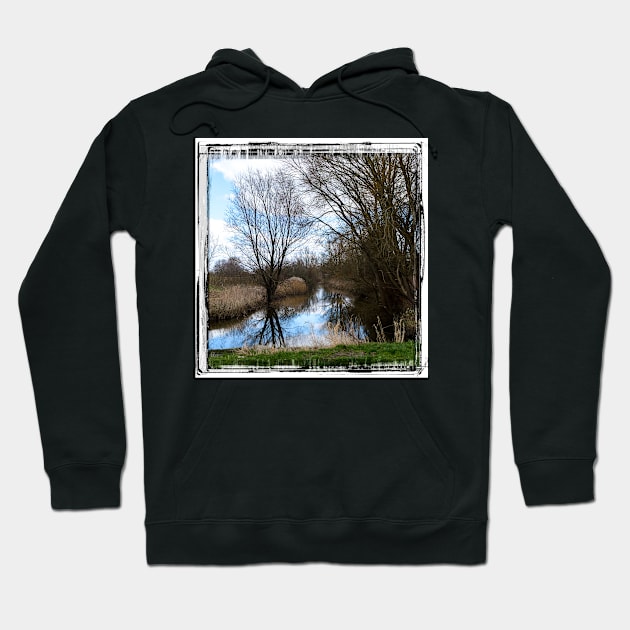 slowly the river flows through the landscape Hoodie by connyM-Sweden